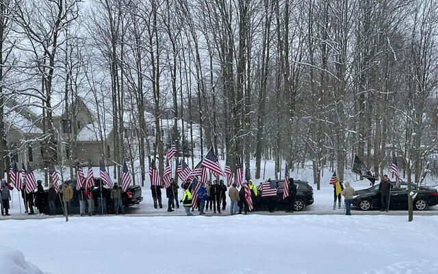 A group of men protest outside of Rep. Casey Weinstein’s home. (Courtesy of Cleveland Jewish News)