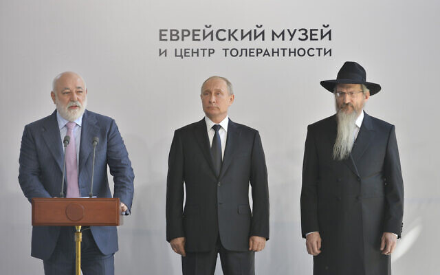 Russian President Vladimir Putin, center, and Russian Chief Rabbi Berel Lazar, right, listen to businessman Viktor Vekselberg speak at a ceremony outside the Jewish Museum of Moscow, Russia, June 4, 2019. (Courtesy of the Jewish Museum and Tolerance Center of Moscow)