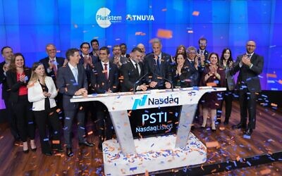 Pluristem and Tnuva celebrated their partnership at NASDAQ in New York on Monday. (Courtesy of Nasdaq, inc.)