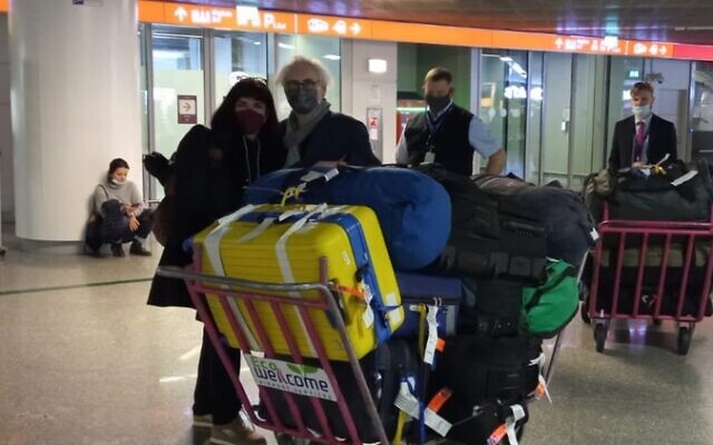 Barbara Cook (left) arrives at Warsaw airport with 20 pieces of luggage. (Courtesy of Beit Polska)