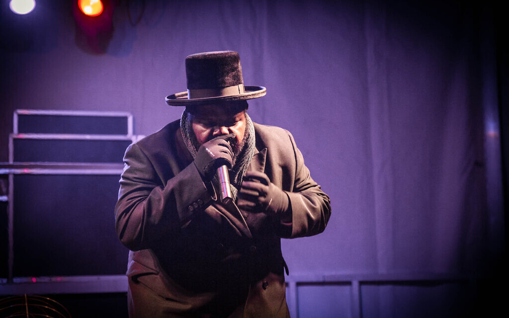 Jewish hip hop singer Nissim Black seen performing during the Chanukah festival in Pittsburgh, April 12, 2018. (Esther Wayne/SOPA Images/LightRocket via Getty Images)