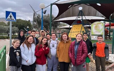 Pittsburgh and Israeli youth congregate outside a park in Israel. Photo courtesy of Tadao Tomokiyo