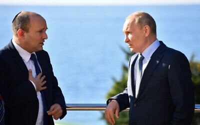 Russian President Vladimir Putin (R) speaks with Israeli Prime Minister Naftali Bennett during their meeting in Sochi, Russia, Oct. 22, 2021. (Yevgeny Biyatov/Sputnik/AFP via Getty Images)