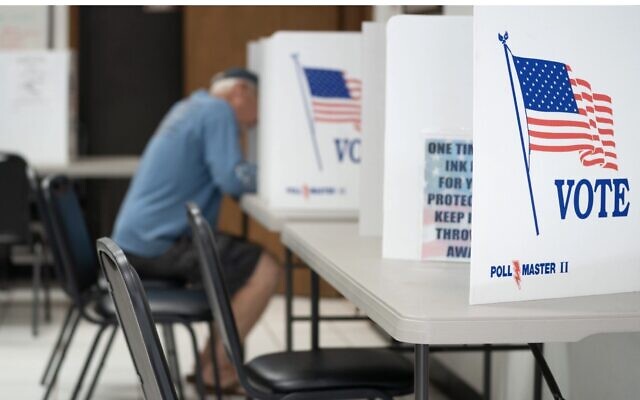 A man fills out a ballot at a voting booth in Mt. Gilead, North Carolina, May 17, 2022. (Sean Rayford/Getty Images)