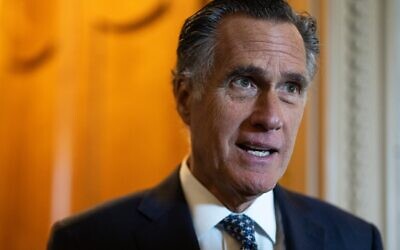 Sen. Mitt Romney, a Utah Republican, speaks to reporters outside of the Senate Chambers during a series of votes in the U.S. Capitol Building, May 11, 2022. (Anna Moneymaker/Getty Images)
