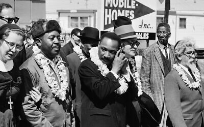 Rev. Martin Luther King Jr. (center) marches with Rabbi Abraham Joshua Heschel (far right) from Selma to Montgomery during the Civil Rights Movement. (Getty)