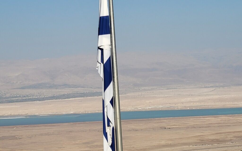 The Israeli flag flies in Masada, the site of historic clashes with the Roman empire millennia ago. Photo by David Rullo.