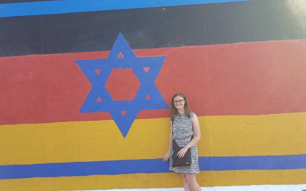 Madison Jackson stands by the Berlin Wall in Berlin, Germany, during her summer spent exploring Jewish Europe in 2018. (Photo courtesy of Madison Jackson)