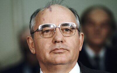 Mikhail Gorbachev, Russian Politburo member and second in line at the Kremlin, announces the death of Soviet Defence Minister Marshal Dmitri Ustinov, before departing from Edinburgh Airport for Russia, in Edinburgh, Dec. 21 1984. Gorbachev was on a week-long trip to Britain. (Bryn Colton/Getty Images)