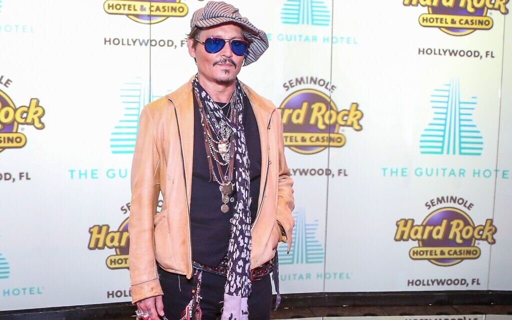 Johnny Depp attends the Grand Opening of the Guitar Hotel expansion at Seminole Hard Rock Hotel & Casino Hollywood, in Hollywood, Florida, October 24, 2019. (Zak Bennett/AFP via Getty Images)