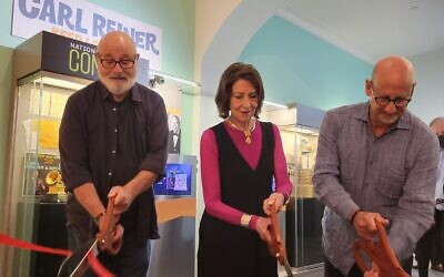 Rob, Annie and Lucas Reiner cut the ribbon on the National Comedy Center’s Carl Reiner exhibit. Photos by David Rullo.