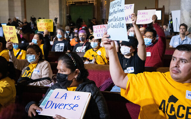 People protest at Los Angeles City Council meeting on Tuesday, October 11, 2022 after council members were recorded making racist comments. (Sarah Reingewirtz/MediaNews Group/Los Angeles Daily News via Getty Images)
