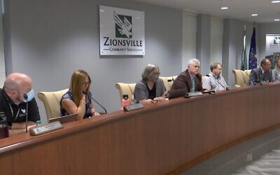 Members of the Zionsville, Indiana, school board shown at a recent meeting. (Screenshot from WTHR)