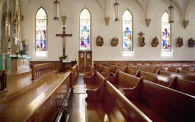 Light shines through the stained glass windows of a church. (Getty Images)