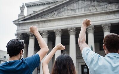 People protesting in Front of the Supreme Court of the United States (Photo by Lara Jameson via Pexels)