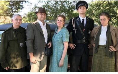 Pennsylvania gubernatorial candidate Doug Mastriano, second from left, poses on the set of a Holocaust era movie filmed in South Carolina, July 11, 2018. (Facebook)