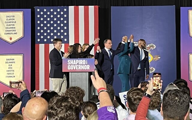 Josh Shapiro, his family and his running mate Austin Davis bask in their victory on stage at The Greater Philadelphia Expo Center.  (Photo by Jarrad Saffren)