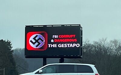 A Local business owner removed Nazi imagery from a billboard he owns after receiving complaints from a Holocaust survivor. Photo by Natalie Byers.