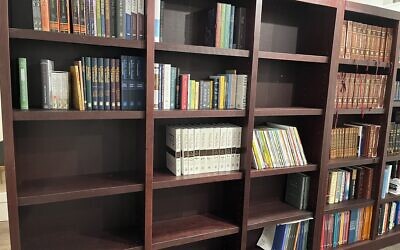 The Chabad Jewish Center of Monroeville is busy filling shelves for its new lending library. Photo provided by Rabbi Mendy Schapiro.