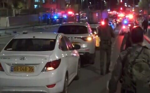 The scene of a deadly terror attack in Jerusalem's Neve Yaakov neighborhood, January 27, 2023 (Channel 12 screenshot via The Times of Israel)