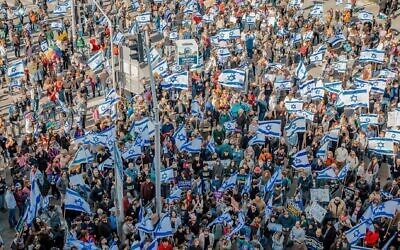Israelis protest against the proposed changes to the legal system in Haifa, on February 20, 2023. (Shir Torem/Flash90)