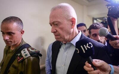Israeli minister of Defense Yoav Galant visits Israelis injured in last night's terror attack, at Belinson Hospital, in Petach Tikva, March 26, 2023. (Avshalom Sassoni/FLASH90)