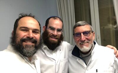 Rabbi Raskin Zalmen (center) is Pittsburgh's newest mohel. He was trained by Rabbi Avi Nidam (left) and Dr. Awizerat (right). Photo provided by Raskin Zalmen.