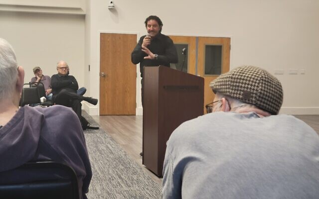 Ali Abu Awwad addresses the crowd at the JCC on Wednesday, Aug. 19. Photo by David Rullo.