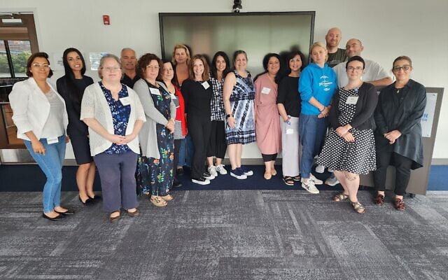 Members of Partnership2Gether's steering committee gather on June 21. Photo by Adam Reinherz