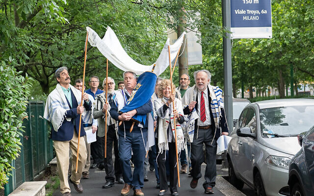 Temple Sinai representatives joined a procession through Milan, Italy after donating a Torah scroll to congregation Lev Chadash. Photo by Dale Lazar