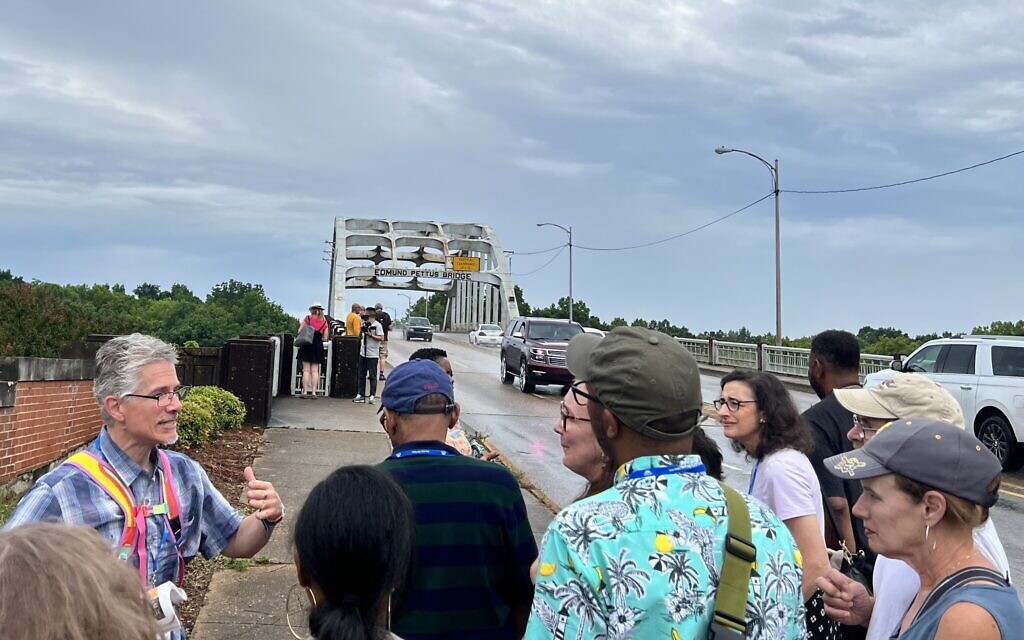 Michael Naragon (left), scholar, with the group at the Edmund Pettus Bridge in Selma (Photo courtesy of Classrooms Without Borders)