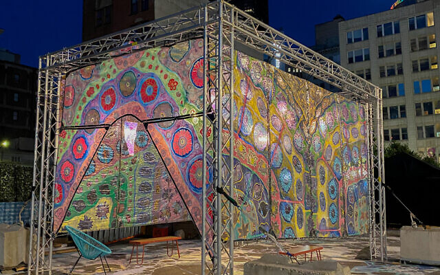 "We Are All Connected To Each Other Through Nature," water based paints and screen printed drawings on vinyl over metal truss and handmade lighting, 12x12x18 ft, by Laurie Shapiro. Photo courtesy of Laurie Shapiro