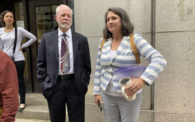 Tree of Life's Rabbi Jeffrey Myers and Maggie Feinstein of the 10.27 Healing Partnership stand outside the federal courthouse after the eighth day of testimony in the Pittsburgh synagogue shooting trial. (Photo by Toby Tabachnick)