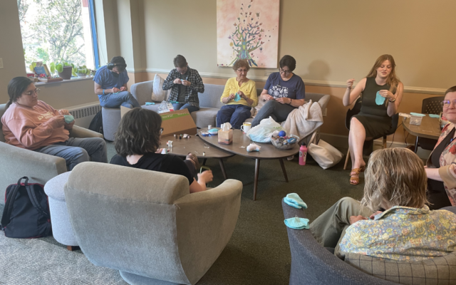 Volunteers sew plush clouds for the victims and family members of victims during the Pittsburgh synagogue shooting trial (Photo by Abigail Hakas)