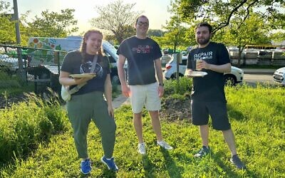 Participants enjoy pizza and a Lag Ba'Omer program with Repair the World Pittsburgh.  Photo courtesy of Repair the World Pittsburgh