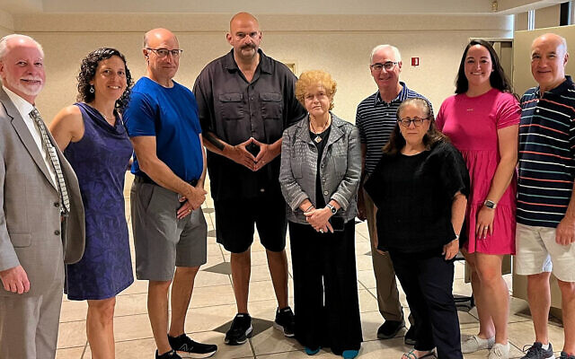 Sen. John Fetterman (D-Pa.) and Deborah Lipstadt, special envoy to monitor and combat antisemitism (center), visit the Tree of Life synagogue, spending time with families and Rabbi Jeffrey Myers (left) on Aug. 29, 2023. (Source: Sen. John Fetterman X/(formerly Twitter), via JNS)