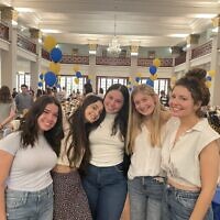 College students are all smiles before enjoying an evening of matzah with 400 friends. Photo courtesy of Chabad on Campus