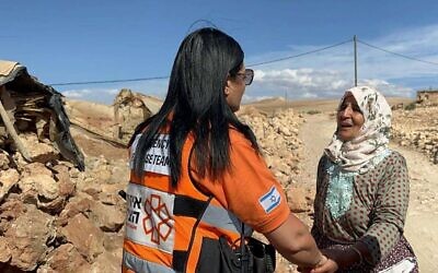 A United Hatzalah volunteer helping local people in Morocco's High Atlas Mountains after Friday's damaging earthquake, Sept. 10, 2023. (Credit: United Hatzalah.)