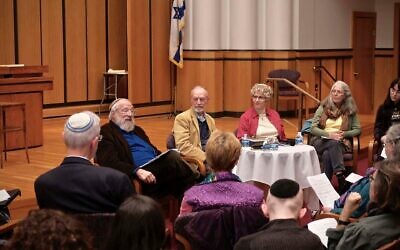 Community members commemorate the Pittsburgh synagogue shooting with Torah study. Photo courtesy of 1027 Healing Partnership