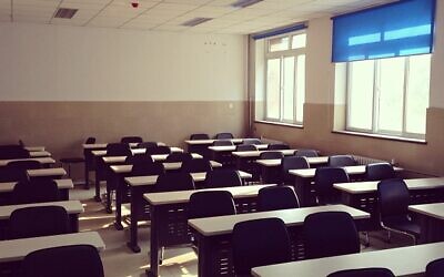 "Empty Classroom" by Vincent In Motion is licensed under CC BY 2.0.