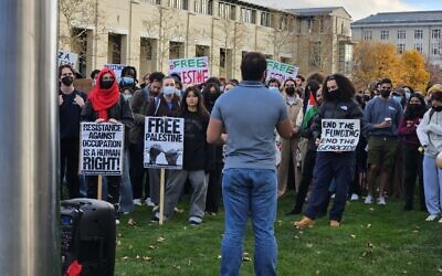 CMU and Pitt students attended an Oct. 9 rally carrying signs in support of Palestine in its war with Israel started by Hamas. (Photo by David Rullo)
