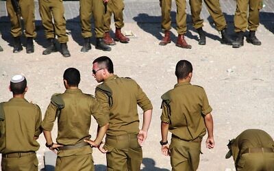 Michal Berman wishes dirty IDF uniforms for other families. Our Kids. (Photo by it is elisa, courtesy of flickr.com)