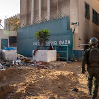 Col. Benny Aharon walks into UNRWA’s headquarters in Gaza City, February 8, 2024. (Emanuel Fabian/Times of Israel)