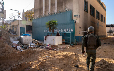 Col. Benny Aharon walks into UNRWA’s headquarters in Gaza City, February 8, 2024. (Emanuel Fabian/Times of Israel)