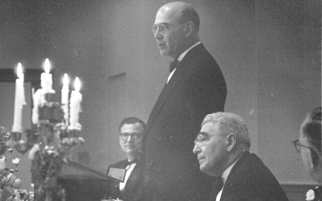 Dr. Solomon B. Freehof of Rodef Shalom Congregation watches Leon Falk Jr. give an address in the new Falk Auditorium of Temple Sinai during the dedication of an addition to the synagogue complex in May1958—photograph by Hans Jonas. (Photo courtesy of the Rauh Jewish Archives)