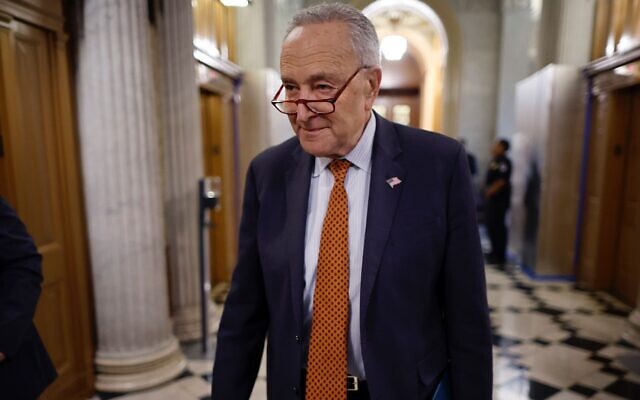 Senate Majority Leader Charles Schumer, a New York Democrat, walks out of the Senate Chamber following a series of votes at the U.S. Capitol, Feb. 12, 2024. (Chip Somodevilla/Getty Images)