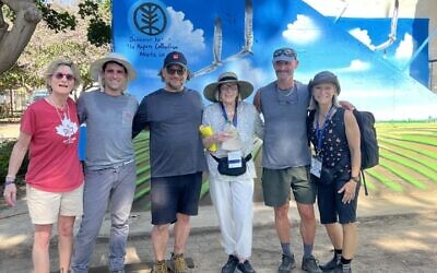 Lisa Taerk (left), Gerry Tissenbaum, Ellen Tissenbaum, Charlene Tissenbaum and Allen Tissenbaum (right) stand before a freshly painted bomb shelter at Kibbutz Urim in the Gaza envelope. The five took part in a recent JNF mission to Israel. (Photo provided by Charlene Tissenbaum)