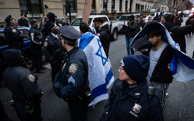 Pro-Palestinian and pro-Israel demonstrators square off outside Columbia University in Manhattan, Feb. 2, 2024. (Photo by Luke Tress)