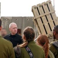 Israel Defense Minister Yoav Gallant speaks to troops at an Iron Dome battery in northern Israel, April 10, 2024. (Ariel Hermoni/Defense Ministry)
