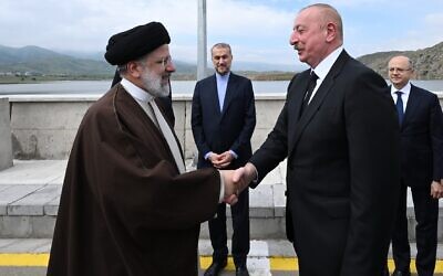 Ilham Aliyev, president of the Republic of Azerbaijan, and Ebrahim Raisi, president of the Islamic Republic of Iran, meeting at the Azerbaijan-Iran border. This is the last photograph taken of Raisi before his death in a helicopter crash a few hours later. (President.az, CC BY 4.0 , via Wikimedia Commons)